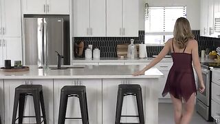 Emma Sirus is dressed inside a cute little sheer lingerie getup as she makes herself cozy in Robby Echo's kitchen.