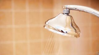 An enjoyable shower getting steamy Goddess when Alexis Adams Enjoying the warm water and the slick soap as she strokes