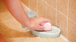 An enjoyable shower getting steamy Goddess when Alexis Adams Enjoying the warm water and the slick soap as she strokes