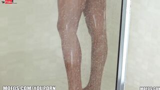sexy Latina with a irresistible pair of breasts is caught in the shower