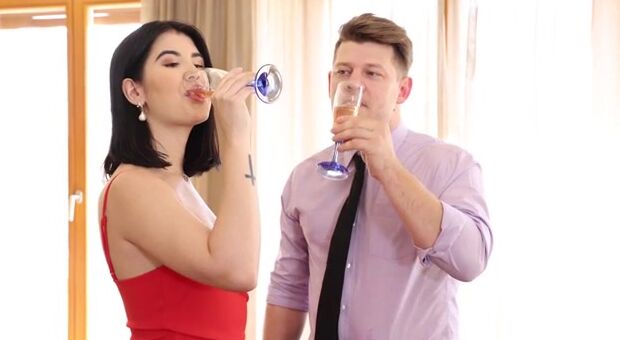 Looking fine in a dress that's meant to impress, Lady D slides the finishing touches on her makeup and then