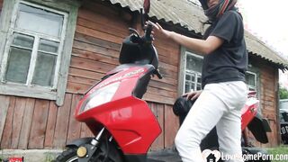 Biker bimbos masturbates on her red motorcycle