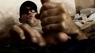 Big dick stud jerking off solo and pissing on himself