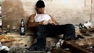 Big dick stud jerking off solo and pissing on himself