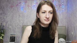 Brunette amateur with naked shoulders on webcam
