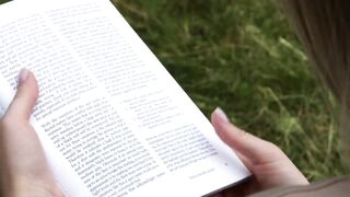 The Hot goddess Amalia Davis is distracted from reading by