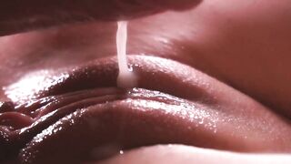 SLOW MOTION. Extremely close-up. Sperm leaking down the vagina
