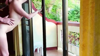 Bent the babe over on the balcony and fucked her while passers-by watched