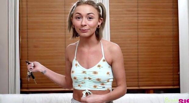 Nathan Bronson finds his stepsister Chloe Temple in the living room searching through the couch cushions. He asks what she's