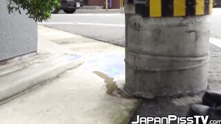 Teenage Asian redhead filmed while peeing on the street