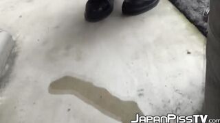 Teenage Asian redhead filmed while peeing on the street