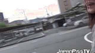 Teenage Asian redhead filmed while peeing on the street