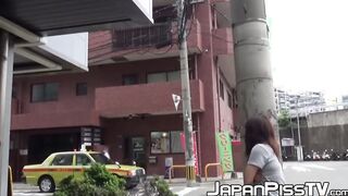 Teenage Asian redhead filmed while peeing on the street