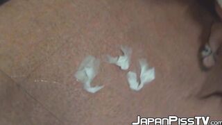 Japanese minx has hairy pussy pissing in hallway