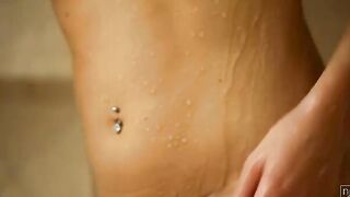 The feel of warm water running over her hot skin is always a turn on