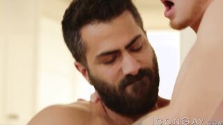 Bearded hunk Adam Ramzi anal fucks twink Zach Covington