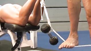 Buff dude restrained on gym bench and whipped for pleasure