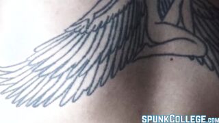 Inked twink teasing while stroking cock passionately solo