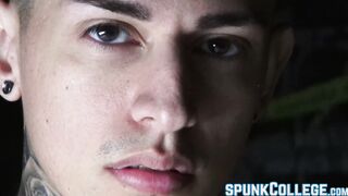 Inked twink teasing while stroking cock passionately solo