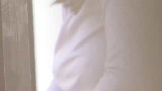 Busty Japanese babe changing clothes on hidden camera