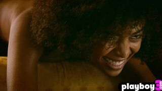 Curly ebony model shows perfect body