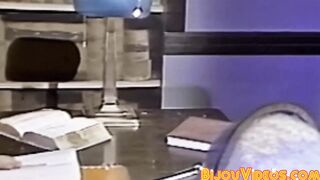 Nerdy college students blow each other in the library