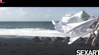 Watch these two babe redheads have wild lesbian sex on the beach