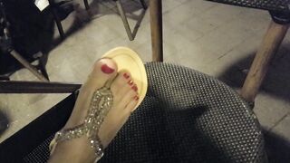 Lover shows sandals, pedicured hot toes red foot