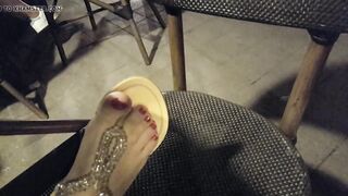 Lover shows sandals, pedicured hot toes red foot