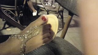 Lover shows sandals, pedicured hot toes red foot