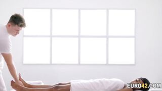 Masseur slides his huge penis inside a slutty black
