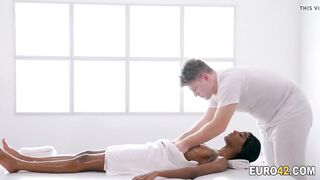 Masseur slides his huge penis inside a slutty black