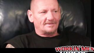 Inked mature guy tugging and stroking his dick solo