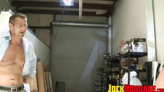 Chained muscular gays whipped by handsome naughty hunk