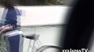 Cute Japanese lady moves her panties to masturbate in public