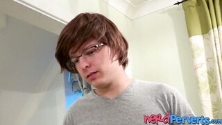Nerdy gamer sucked skillfully by a cute babe with glasses