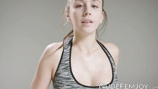Busty young beauty working out while topless