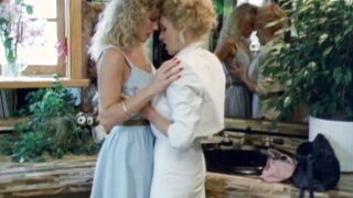 Pussy licking and dildo action with vintage busty lesbians