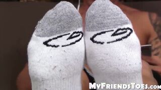Cute brunette Vlad with tattoos shows off his feet
