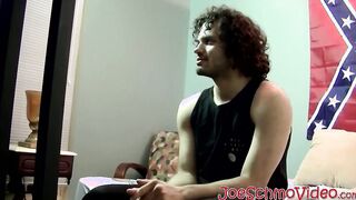 Handsome dude with curly black hair jerking off his big cock