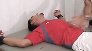 Ticklish and sexy soccer player is bound on the table