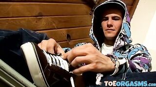 Young foot lover Clyde strokes his cock and cums on his feet
