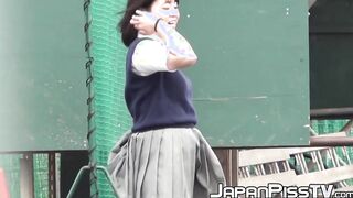 Naughty Japanese schoolgirls pissing in secret public place