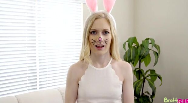 Perky little spinner Emma Stone is in the Easter spirit as she wanders her house dressed as the Easter bunny.