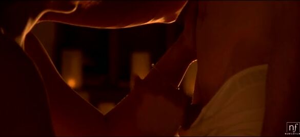 The film is set for seduction. Luna Ruiz lets Lobo blindfold her and then sits patiently into her bra and
