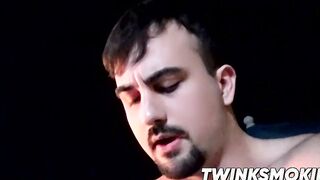 Cute young smoker works on his stiff dick and spunks