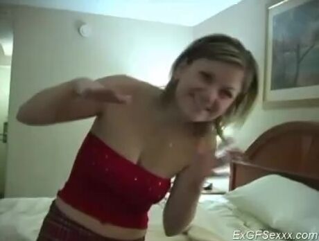 Racy bimbo licking nuts