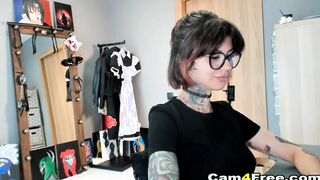 Tattooed Woman slides Her Fingers deep into Her Wet Pussy