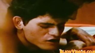 Stud goes deep inside of his partner in vintage gay video