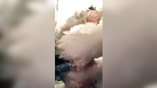 Inked huge tit bimbo toying anal inside toilet